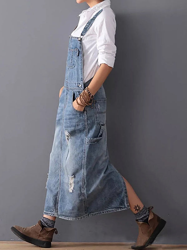 Dame denim-overallskjole med slidte detaljer og slids bagpå