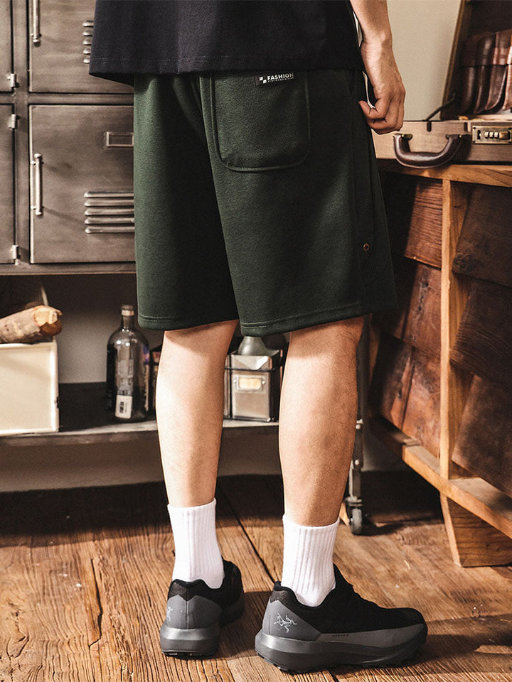 Afslappede knælange sweatshorts til mænd med snøre og stikningsdetaljer