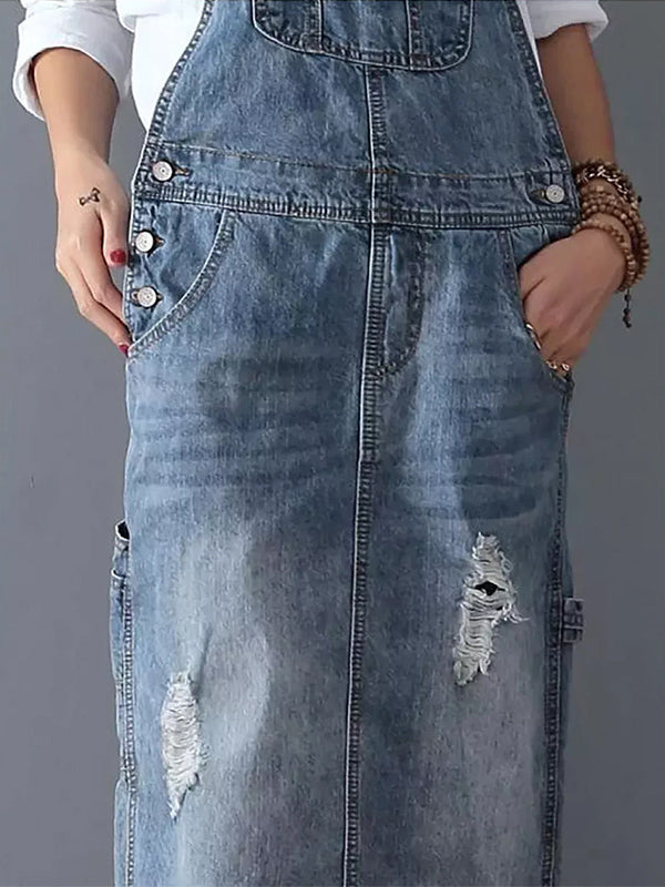 Dame denim-overallskjole med slidte detaljer og slids bagpå