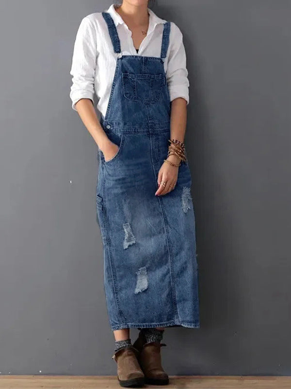 Dame denim-overallskjole med slidte detaljer og slids bagpå