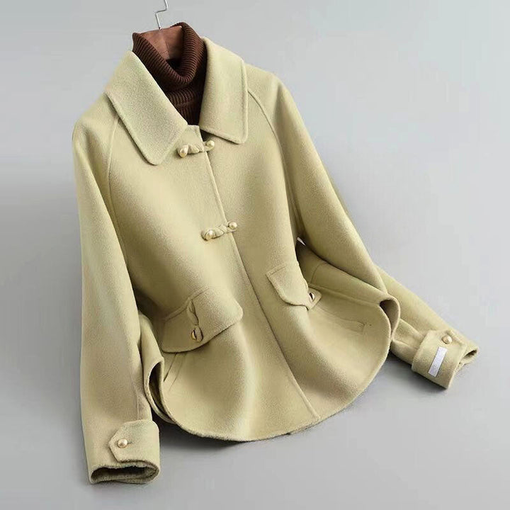 Abrigo elegante con detalles de bolsillos para mujer