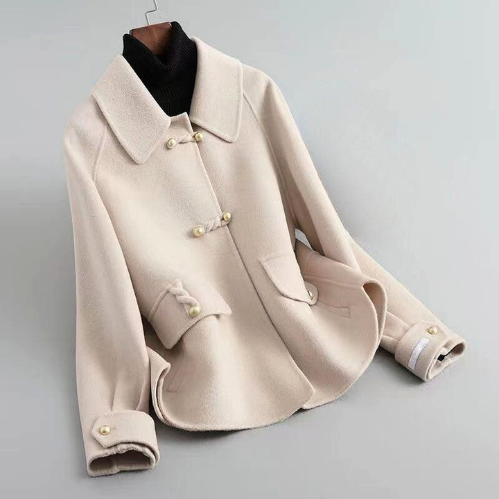 Abrigo elegante con detalles de bolsillos para mujer