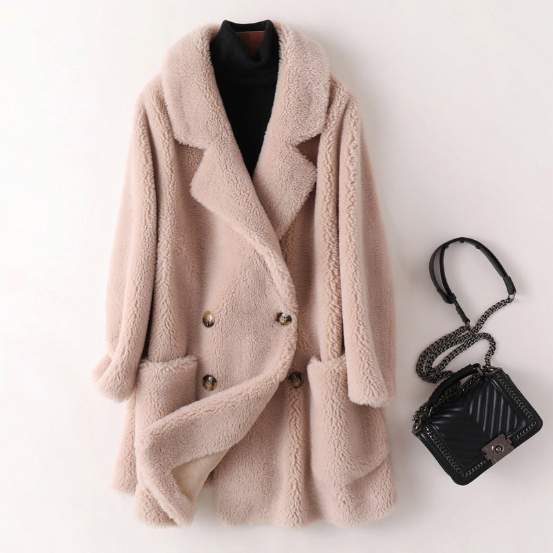 Manteau d’extérieur pour femme en imitation peau lainée à double boutonnage
