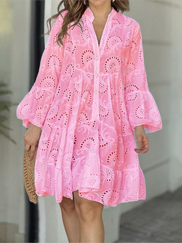 Vestito corto a balze con motivo da donna