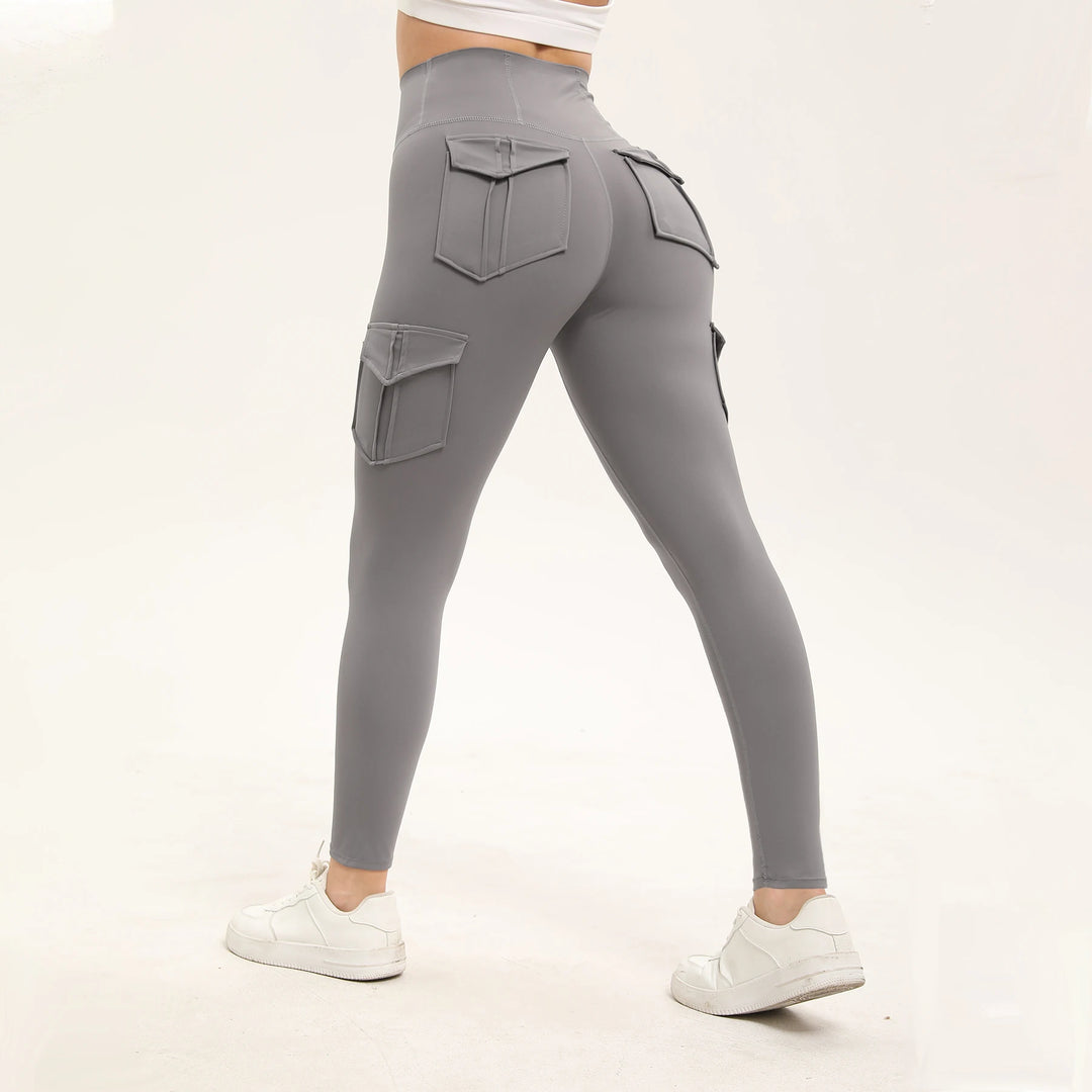 Dame træningsleggings med høj talje i ensfarvet design og lommer