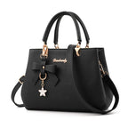 Elegant Women's Messenger Bag with Flower Pendant black 28cmx11cmx19cm