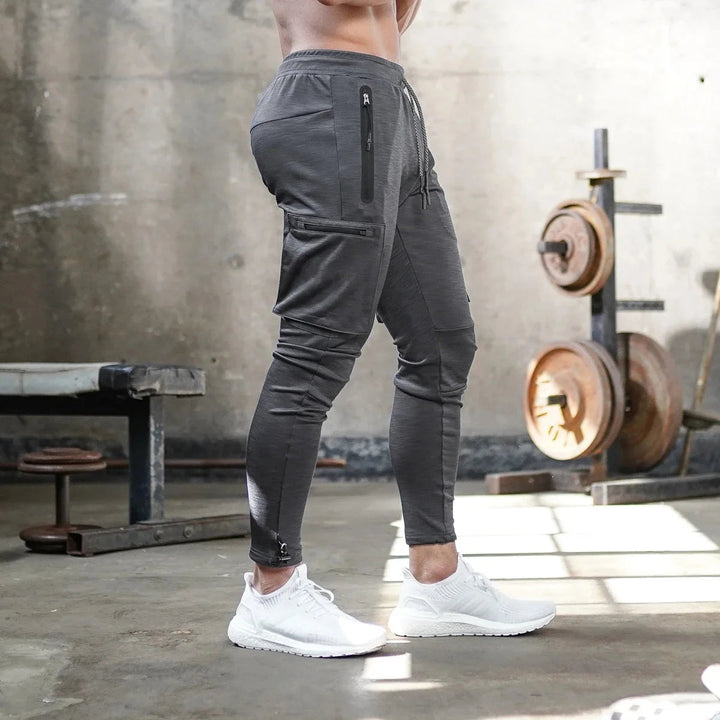 Pantalon de jogging sportif ajusté pour homme avec poches zippées