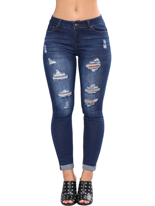 Damejeans med stretch, revet ved anklerne