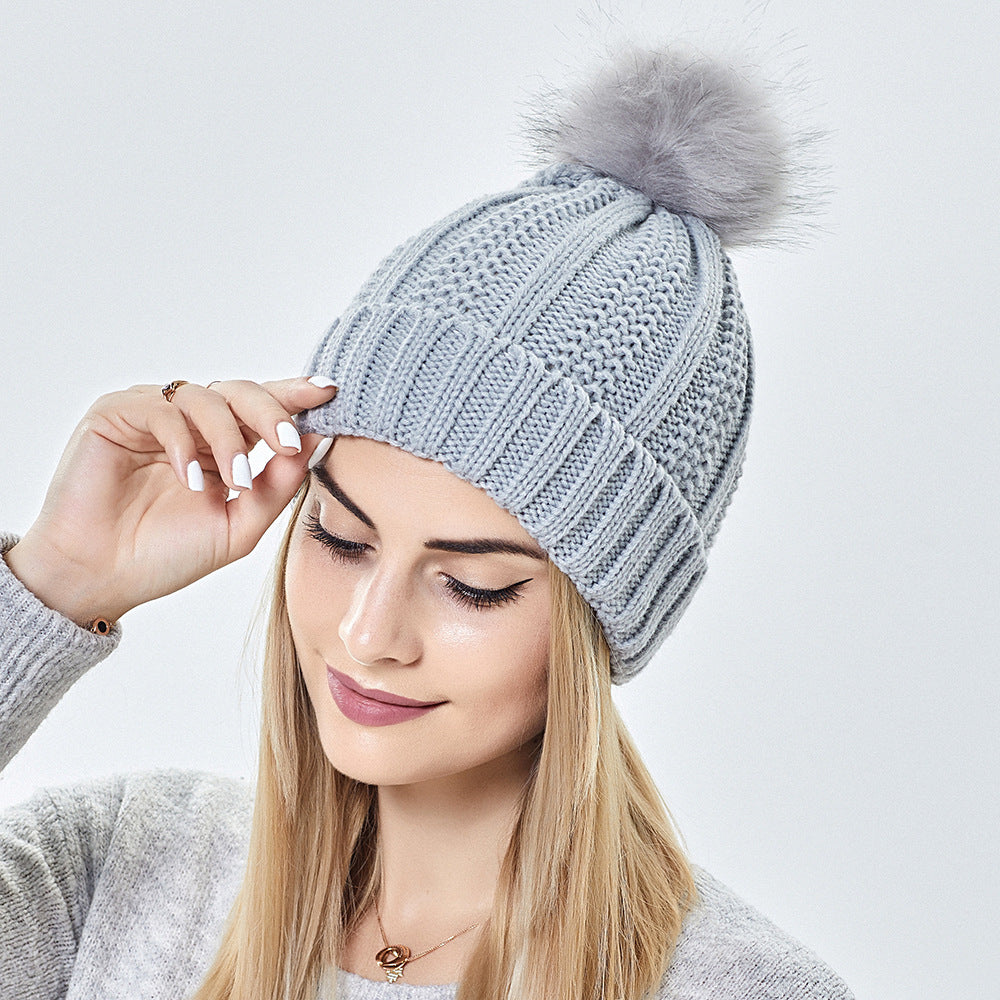 Stylish Winter Knitted Beanie Hat for Women with Faux Fur Pom Pom