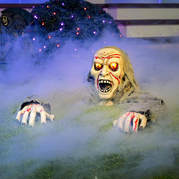 Halloweenův zombie průkopník s rozsvícenýma očima a děsivým zvukem