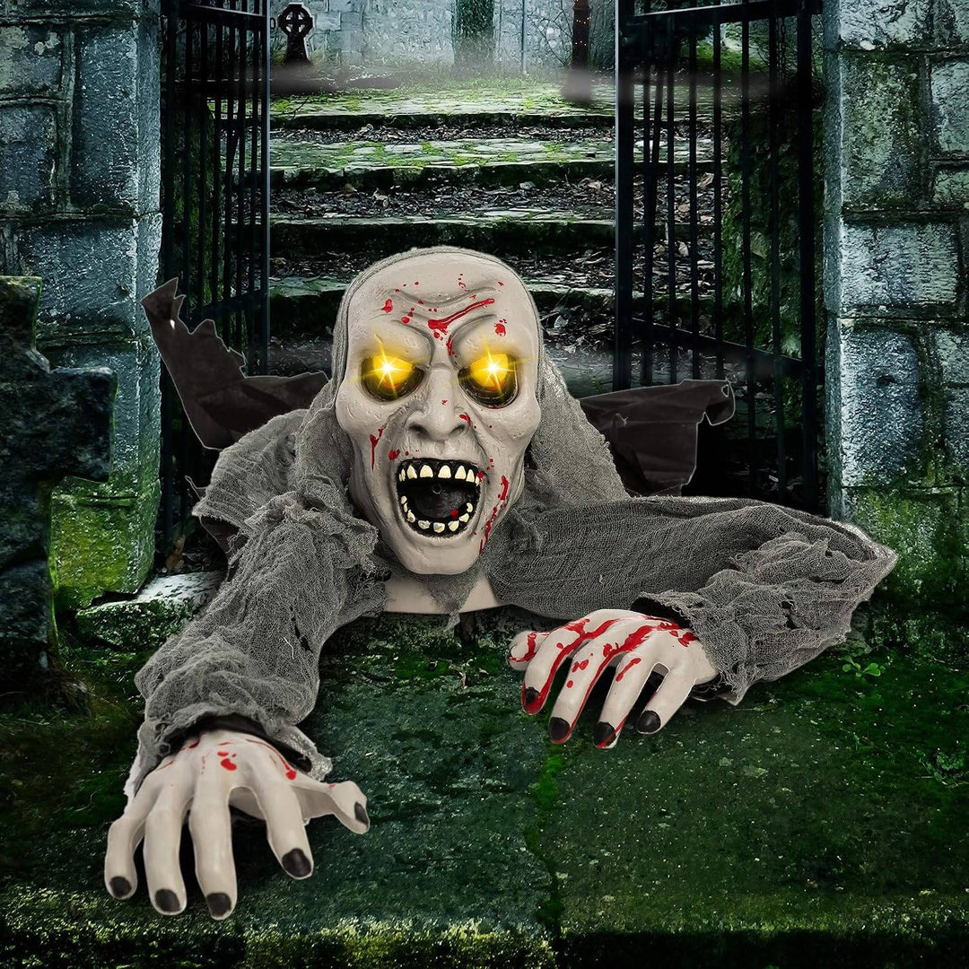 Halloweenův zombie průkopník s rozsvícenýma očima a děsivým zvukem