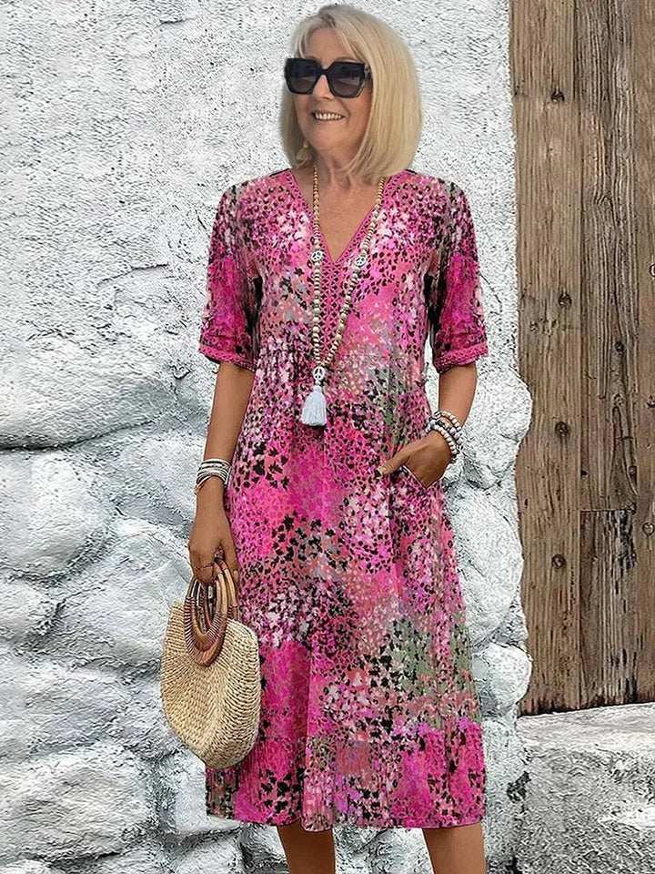 Emily | Damen Midi-Kleid in Übergröße mit V-Ausschnitt, Blumenmuster und Taschen