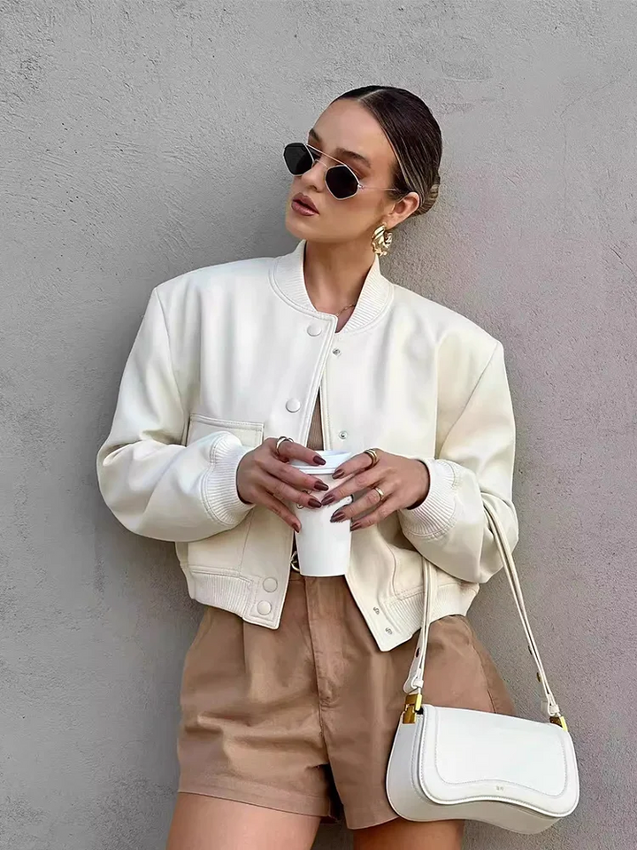 Giacca bomber corta in pelle da donna con tasche con bottoni automatici