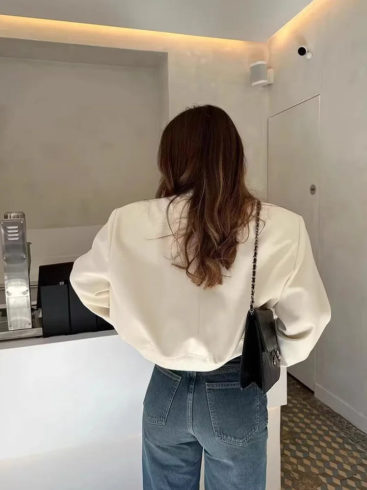 Giacca bomber corta in pelle da donna con tasche con bottoni automatici