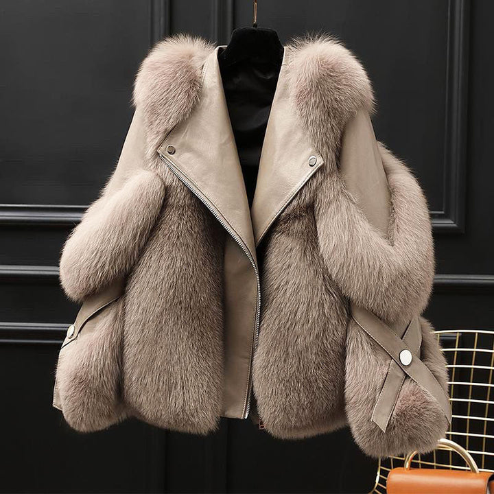 Veste femme oversize en cuir avec col en fourrure et fermeture zippée sur le devant
