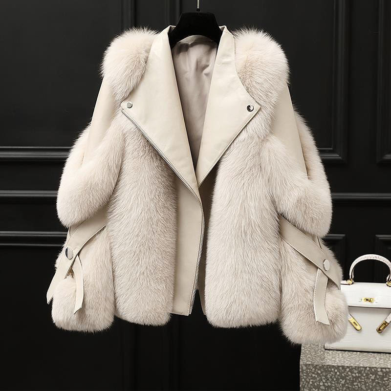 Veste femme oversize en cuir avec col en fourrure et fermeture zippée sur le devant
