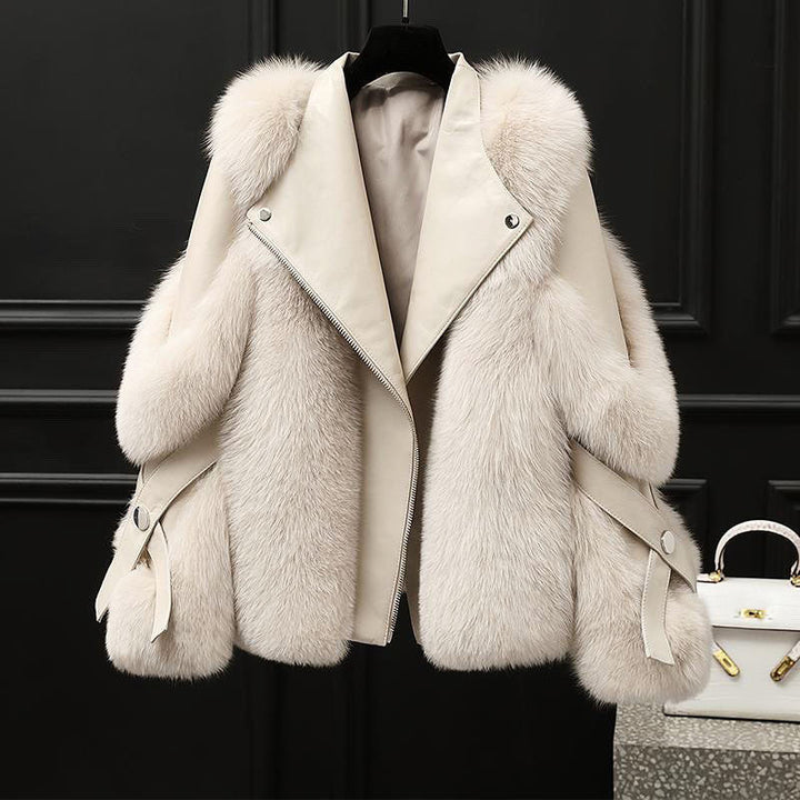 Veste femme oversize en cuir avec col en fourrure et fermeture zippée sur le devant