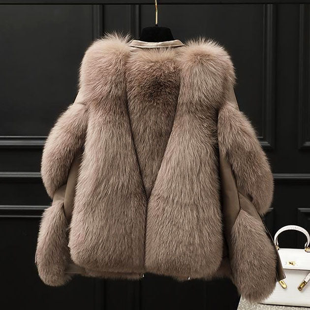 Veste femme oversize en cuir avec col en fourrure et fermeture zippée sur le devant