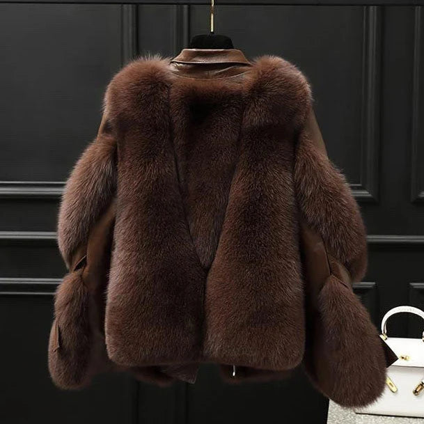 Veste femme oversize en cuir avec col en fourrure et fermeture zippée sur le devant