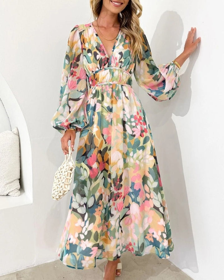 Grace | Kvinders blomstrede chiffon midi-kjole med pufærmer og V-hals